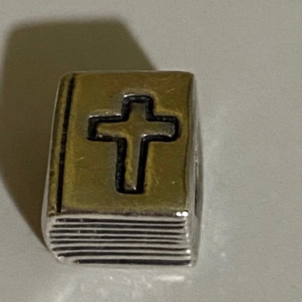 Authentic sterling silver pandora bible charm.